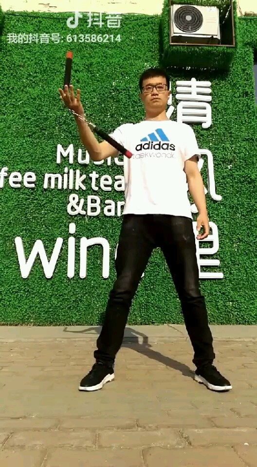 阻指转棍